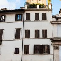 white facades of urban houses of Rome city photo