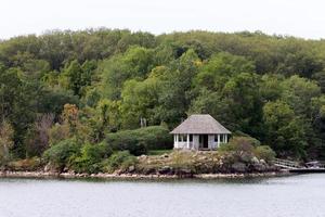 The Thousand Islands is an archipelago of islands that stretch along the border of Canada and the United States along the St. Lawrence River. photo