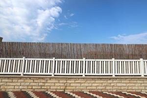 Fence in the city park on the shores of the Mediterranean Sea. photo