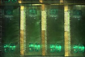 Illustration of glowing euro banknotes with a green kirlian aura around them. photo