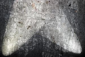 vista de cerca de las texturas de las paredes de hormigón con tres focos foto