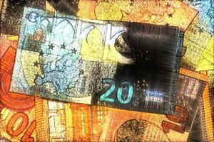 Illustration of glowing euro banknotes with a green kirlian aura around them. photo