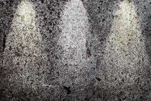 Close up view on concrete wall textures with three spotlights photo