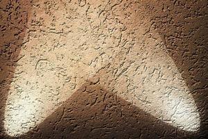 Close up view on concrete wall textures with three spotlights photo