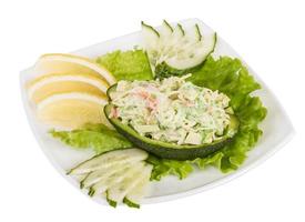 Crab meat salad with green caviar in avocado - japan cusine photo