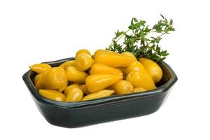 Yellow marinated pepper photo