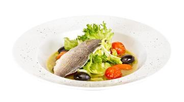 sopa de pescado con dorado y verduras foto