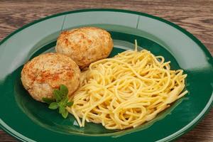 Spaghetti with homemade chicken cutlet photo