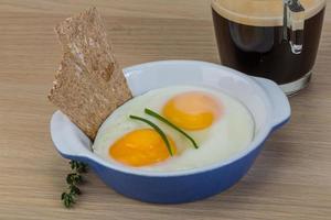 Breakfast with eggs and coffee photo