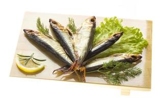 Smoked sprat - appetizing snack photo