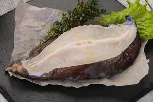 Raw wolffish steak photo