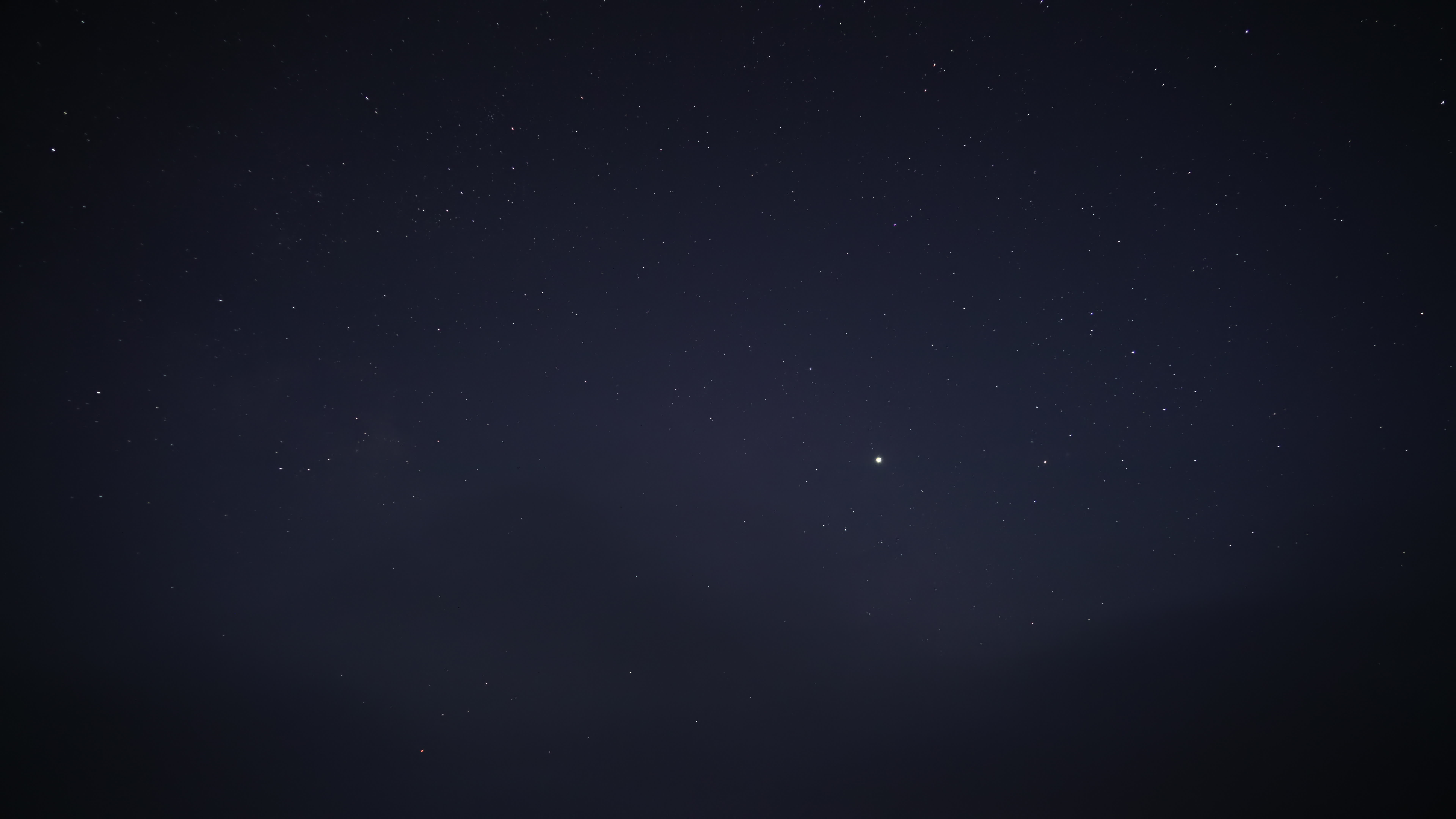 8K Stars in the blue sky during the day disappear into the clouds at