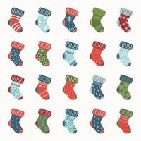 A set of cute Christmas socks with patterns and ornaments. Vector illustration.