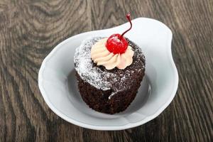 Cupcake with cherry photo