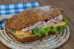 Ciabatta with cheese and bacon photo