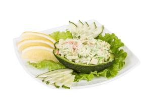 Crab meat salad with green caviar in avocado - japan cusine photo