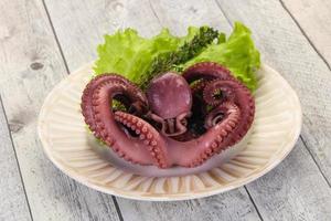 Boiled octopus with herbs photo