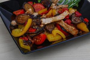 Fried pork with vegetables photo