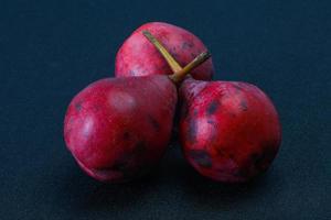 Ripe sweet red pear heap photo