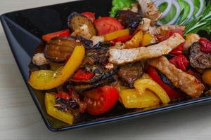 Fried pork with vegetables photo