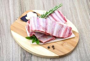 Raw lamb ribs photo