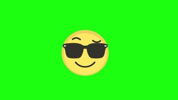 genial emoji feliz en icono de gafas de sol, sonrisa, expresión, animación en bucle con canal alfa. video