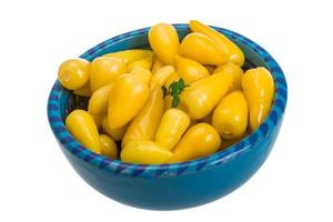 Yellow marinated pepper photo