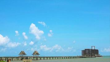 Abandon temple and pavillion and heap beautiful white cloud clear blue sky huge rolling in the rainy season time lapse video