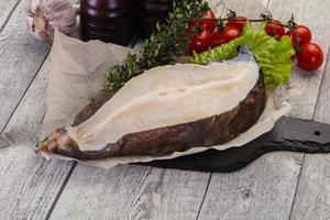 Raw wolffish steak photo