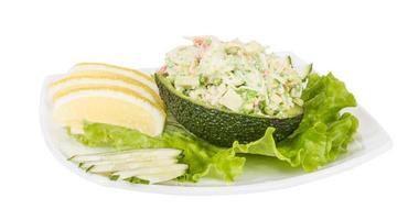 Crab meat salad with green caviar in avocado - japan cusine photo