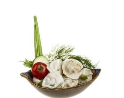 Bowl with traditional russian dish - pelmeni photo