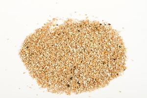 Pearl barley heap isolated on white photo