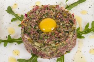steak tartare with egg photo
