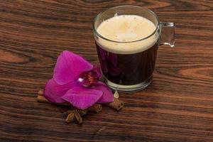 Espresso with orchid photo