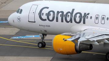 DUSSELDORF, GERMANY JULY 22, 2017 - Condor Airbus 320 D AICE towing before departure, Dusseldorf airport, Germany video