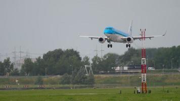 AMSTERDAM, THE NETHERLANDS JULY 27, 2017 - KLM Cityhopper Embraer 175 PH EXF landing on runway 18R Polderbaan. Shiphol Airport, Amsterdam, Holland video