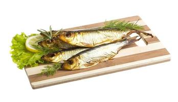 Smoked sprat - appetizing snack photo