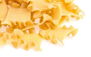 Raw yellow Italian pasta photo