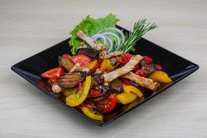 Fried pork with vegetables photo