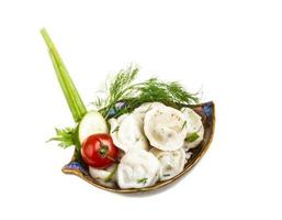 Bowl with traditional russian dish - pelmeni photo