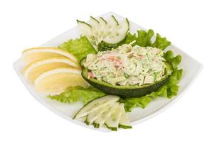 Crab meat salad with green caviar in avocado - japan cusine photo