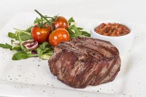 Grilled Beef Steak Isolated On a White Background photo