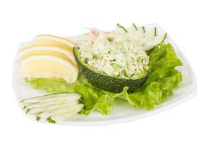 Crab meat salad with green caviar in avocado - japan cusine photo