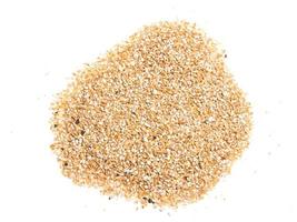 Pearl barley heap isolated on white photo