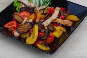 Fried pork with vegetables photo