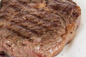 Grilled Beef Steak Isolated On a White Background photo