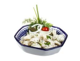 Bowl with traditional russian dish - pelmeni photo