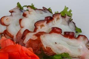 Octopus sashimi on white background photo