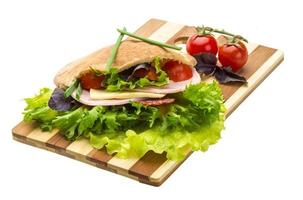 Bread with sausages and salad photo