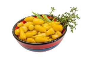 Yellow marinated pepper photo